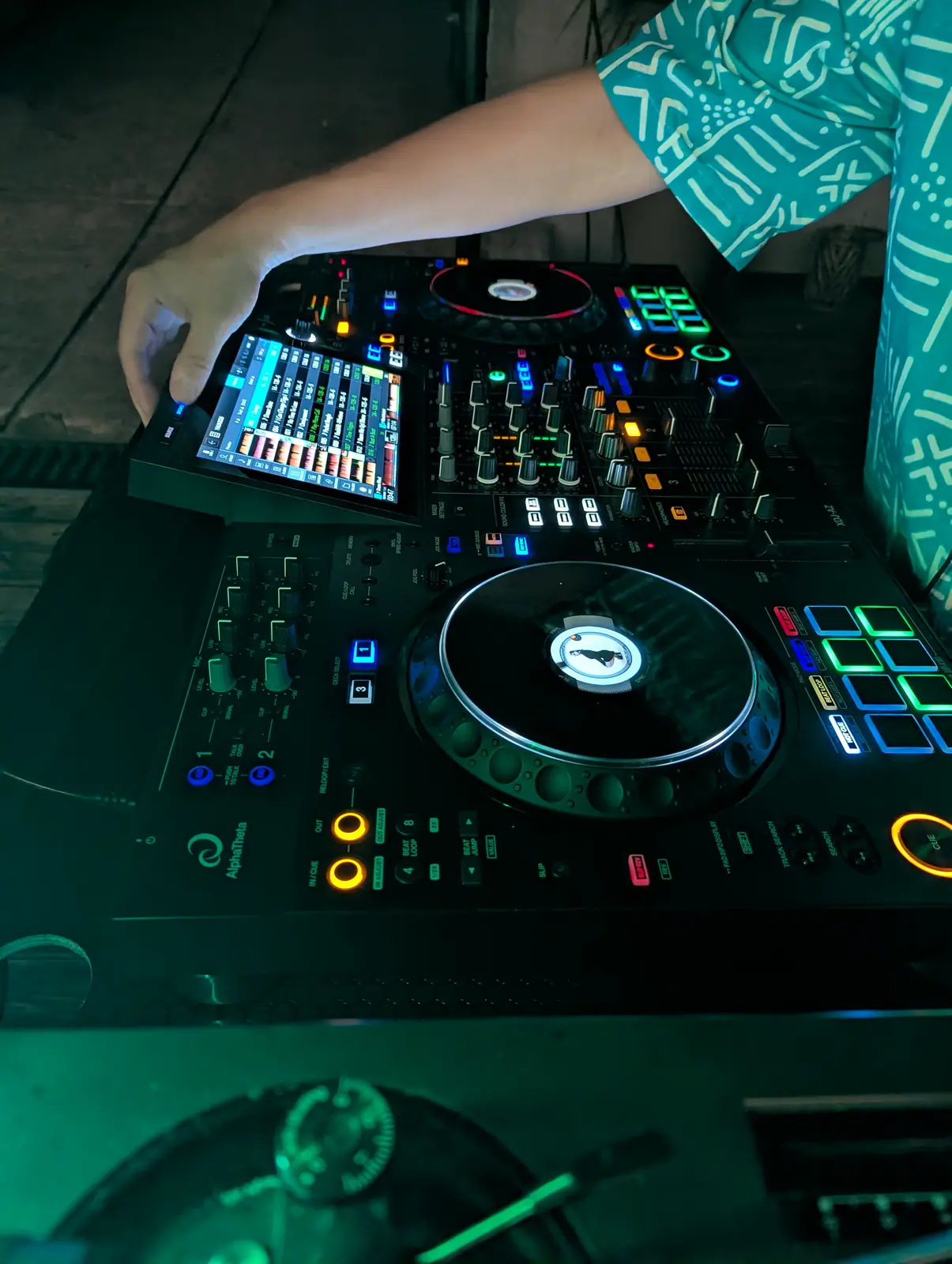 Hands on the Pioneer XDJ-AZ during an evening set